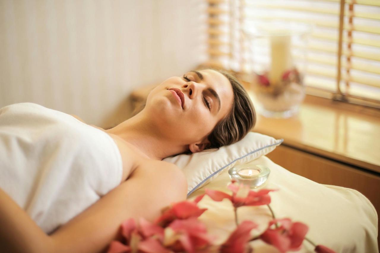 The woman lay down for a massage session.