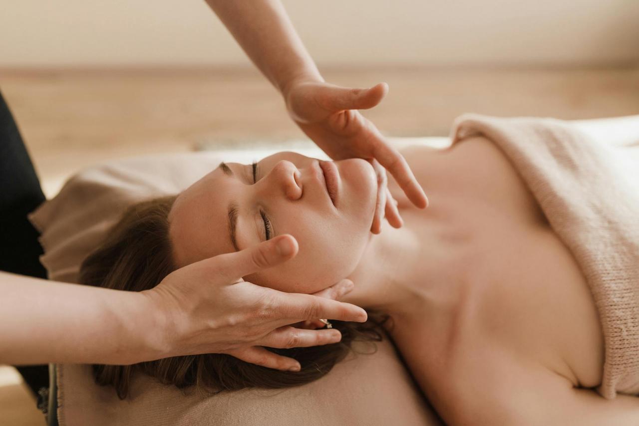 The woman feels relaxed during the Swedish massage session.